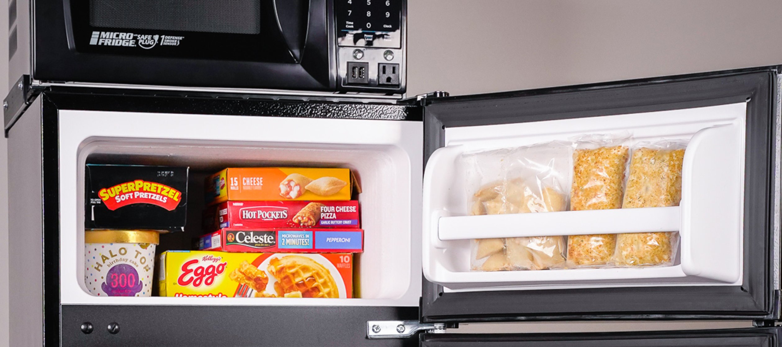 Microfridge combination microwave, refrigerator and freezer.